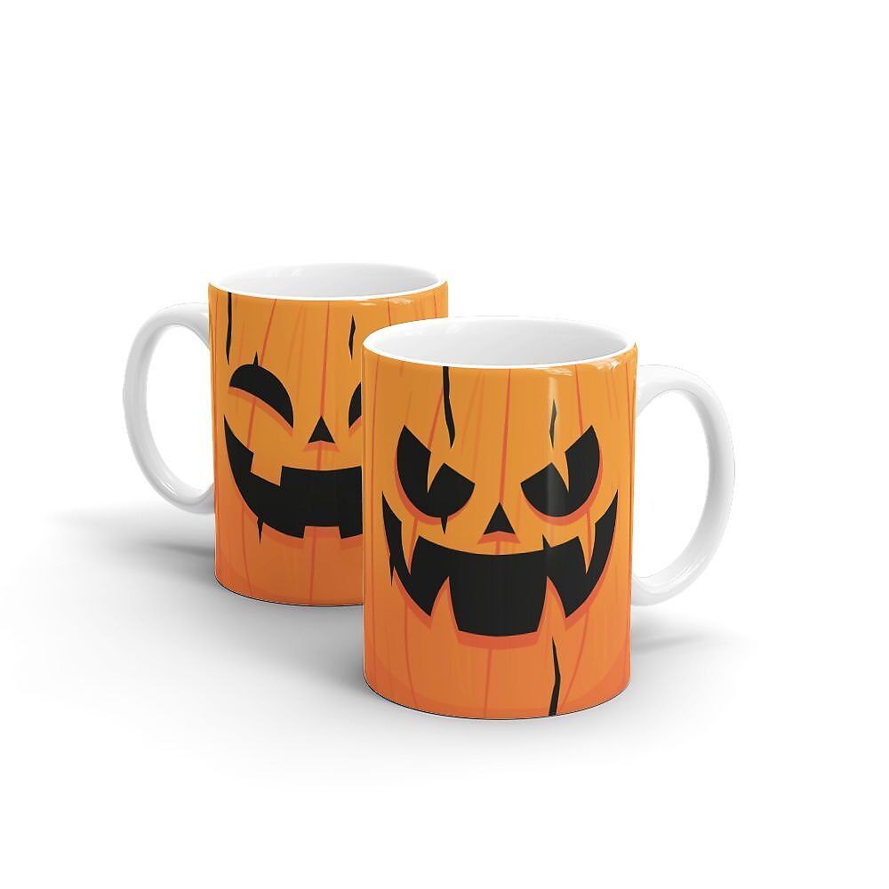 Duas canecas laranja com rosto de abóbora de Halloween